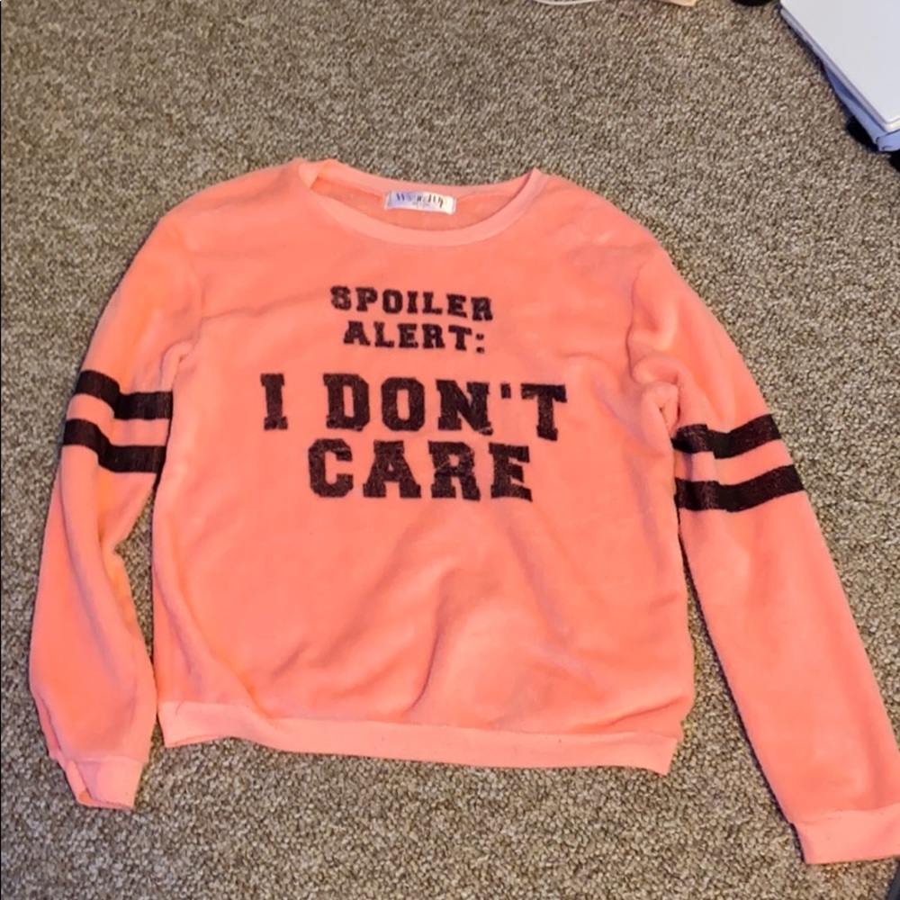 pink fluffy long sleeve shirt with quote